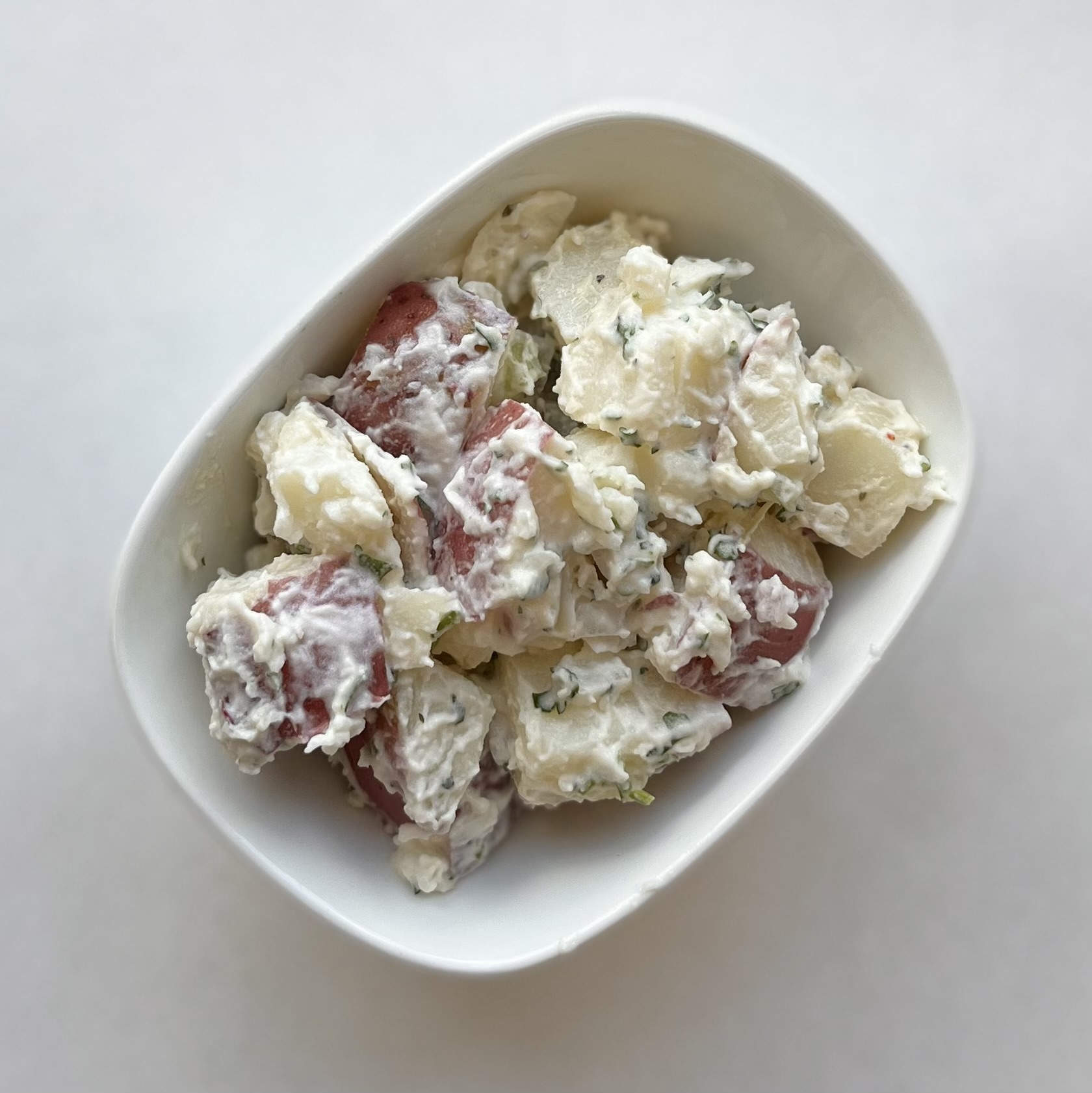 Refreshing Avon Prime Meats potato salad, made by our chefs with fresh ingredients.