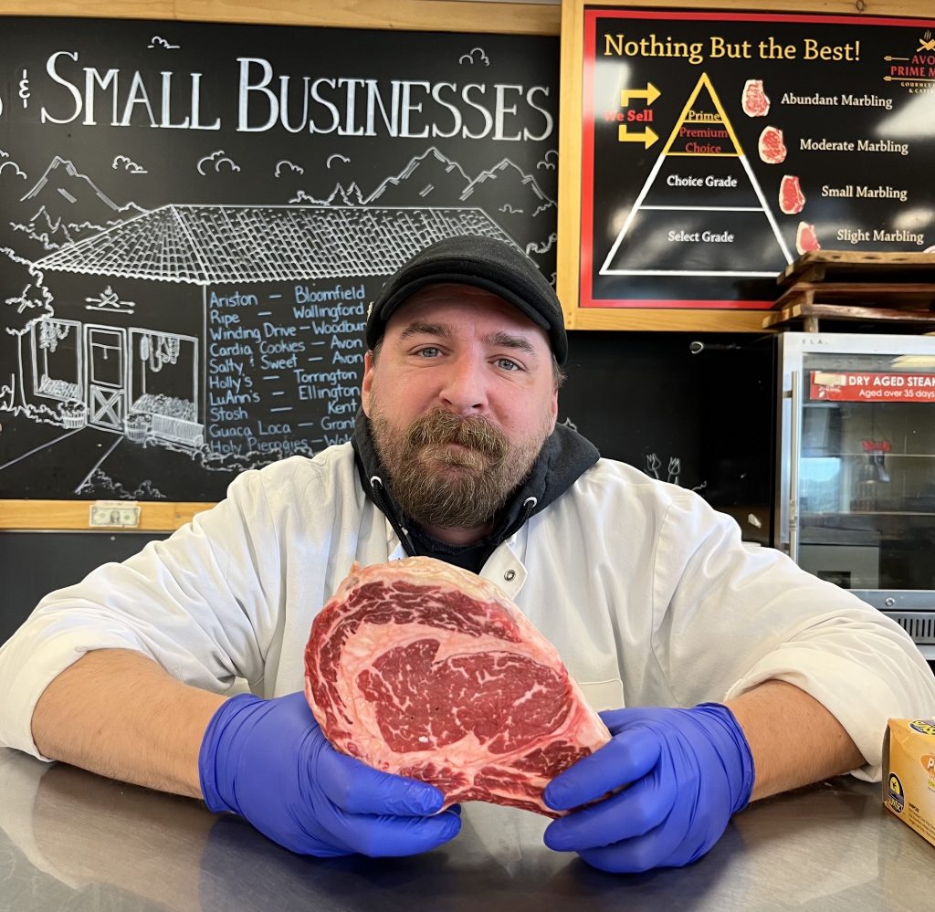 Butcher Rocky with a fresh cut Cowboy steak