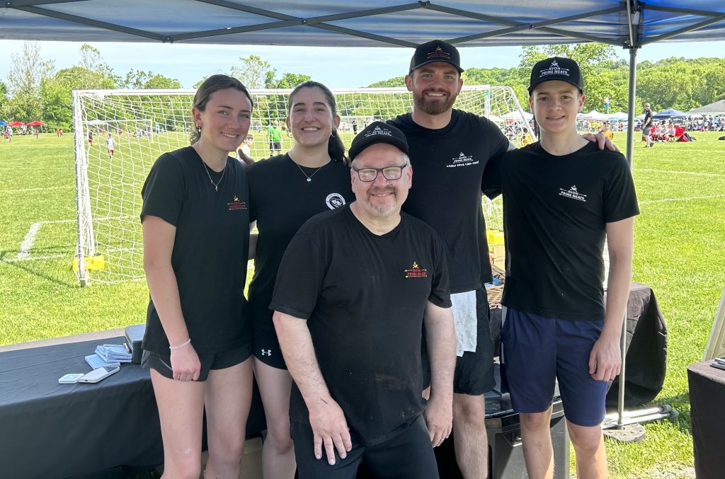 Our chefs and team cooking food at Avon's 2024 Memorial Day Soccer Tournament.